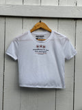 KOKI’O KEA (WHITE NATIVE HIBISCUS) EVERYTHING IN ME WHITE CROPPED FLOWY TEE
