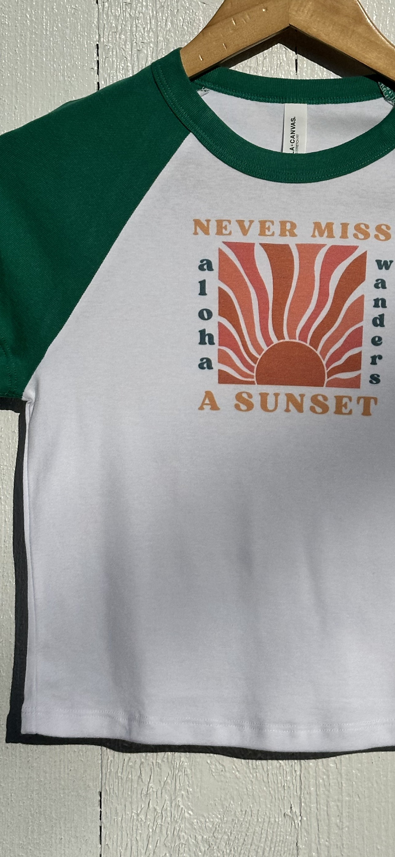 NEVER MISS A SUNSET RAGLAN BABY TEE