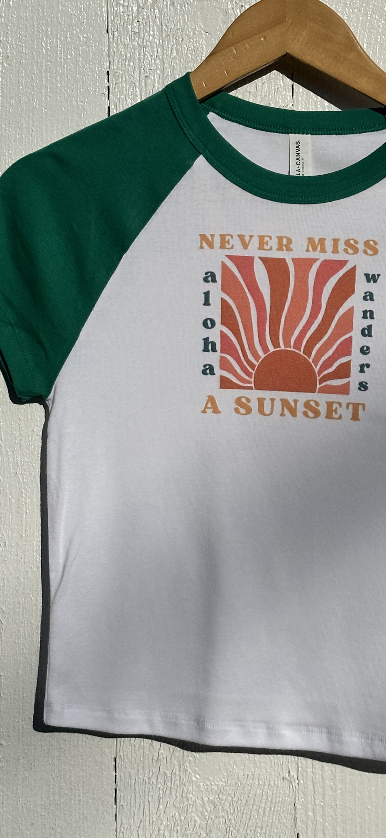 NEVER MISS A SUNSET RAGLAN BABY TEE