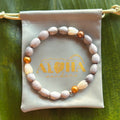 Job’s tears seeds, freshwater Champaign pearls, Pikake flowers, 8-8.5 stretchy bracelet